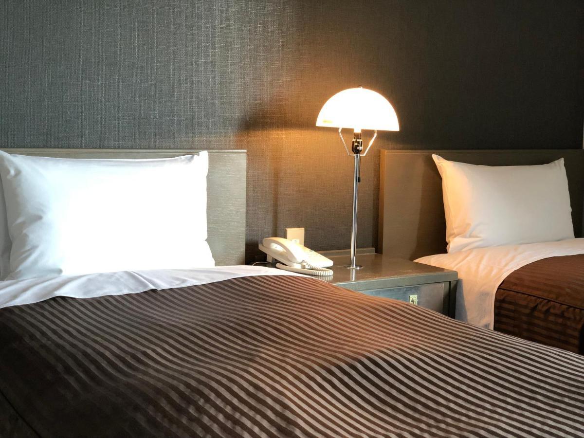 Hotel New White House Rumoi Buitenkant foto
